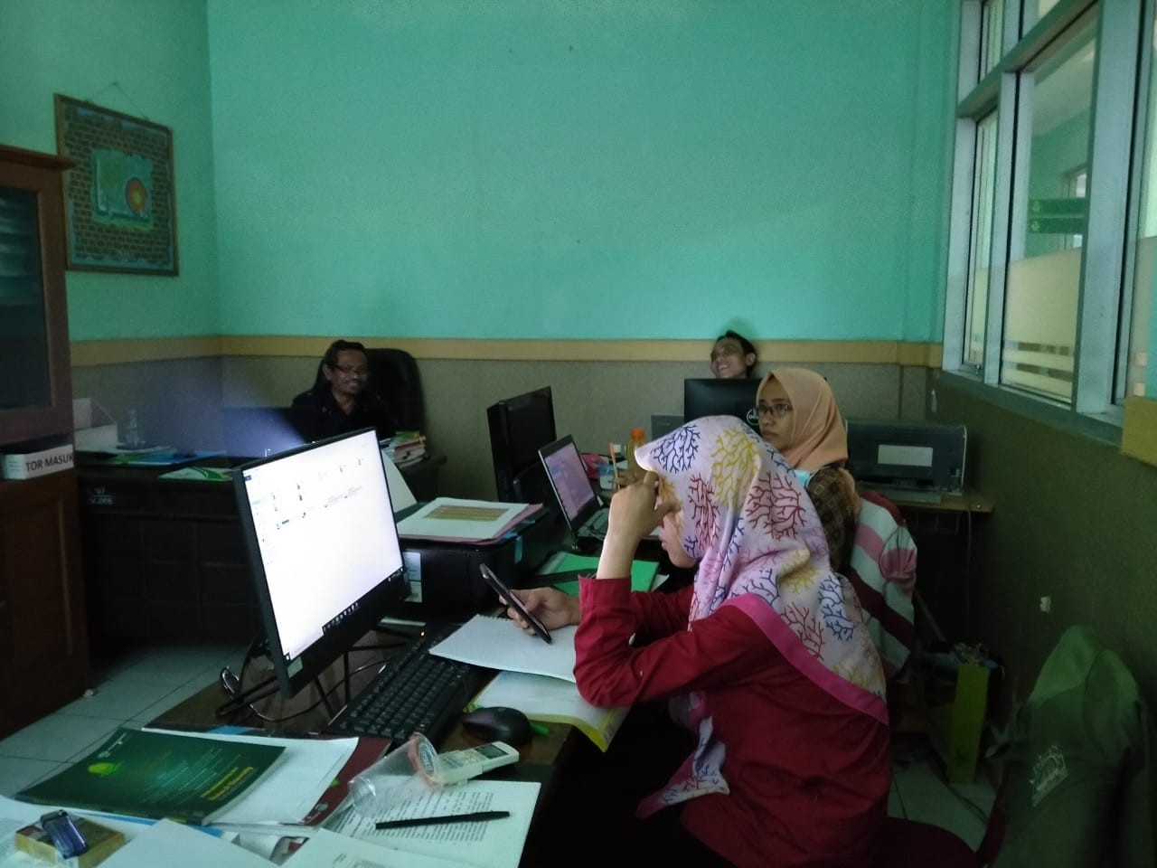 review buku pedoman